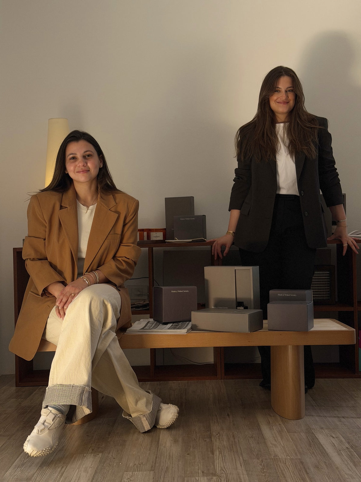 Sara Essam and Zeina Aboolnour, the founders of Vela, with the brand's packaging
